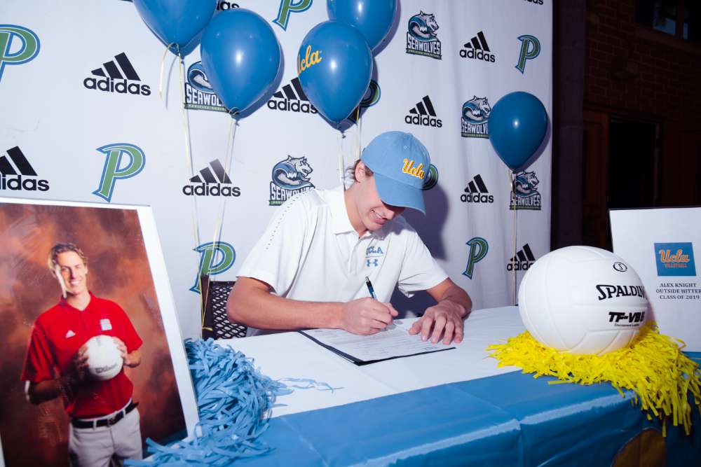 Alex Knight signing contract