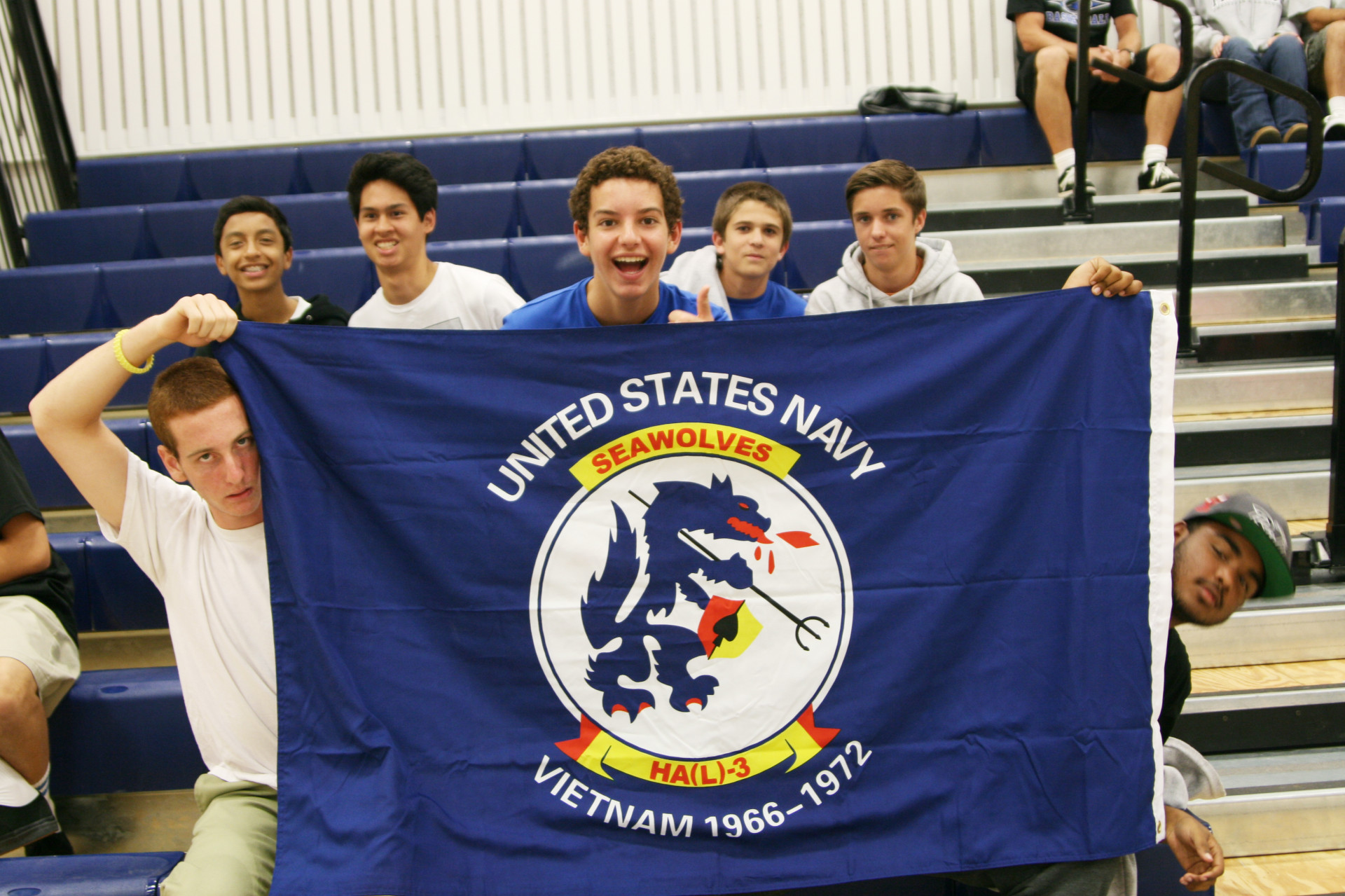 students with Seawolves banner
